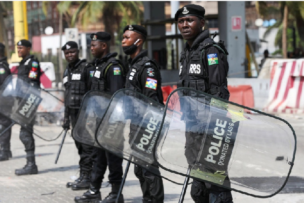 Security forces stand guard during a protest against the reopening of the Lekki toll gate[Reuters]