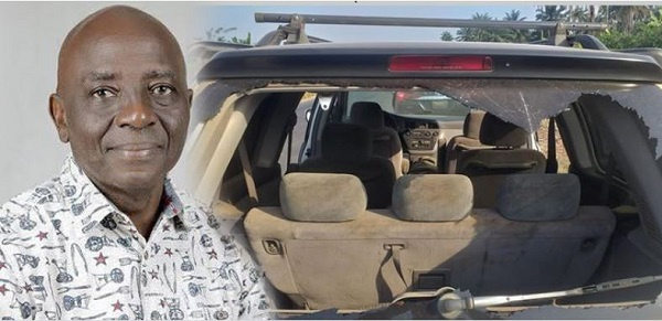 Senator Adelere Oriolowo and the vandalised vehicle