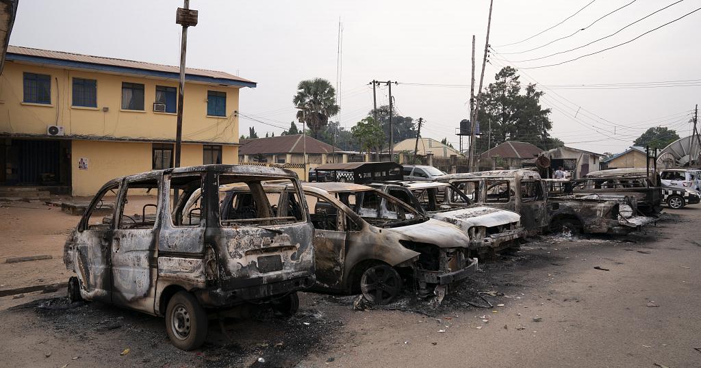 Burned vehicles are parked outside the police command headquarters in Owerri, Nigeria, on Monday, April 5, 2021