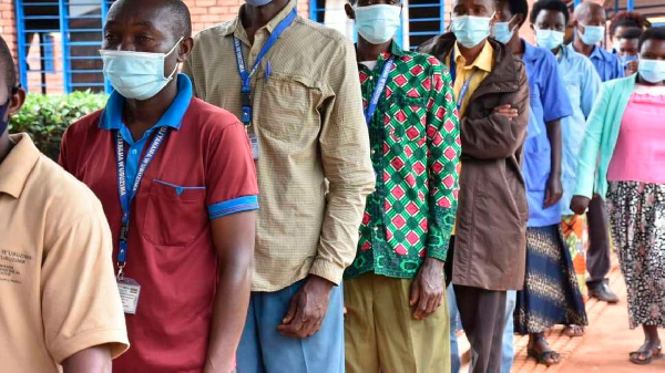 Community Health Workers lining up to receive Covid-19 vaccine at Kirehe Health Center