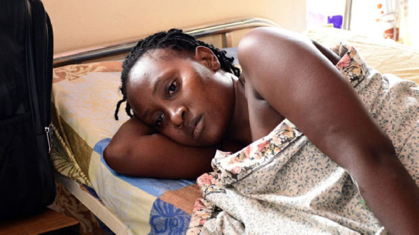 Justine Namambo, 28, who was shot in the spinal cord at Mulago hospital on November 26