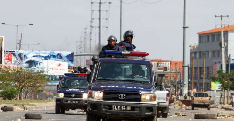 Police officers are in Luanda, Angola, on November 11, 2020. Police recently arrested and detained journalist Jorge Manuel.