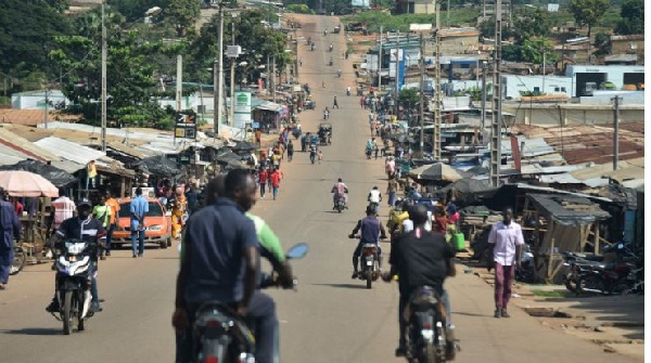 Residents on a street in Daoukro, Ivory Coast