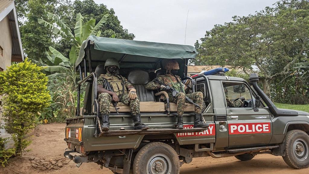 Security forces are seen near the house of Presidential candidate Robert Kyagulanyi, also known as Bobi Wine, in Magere, Uganda, on January 16, 2021