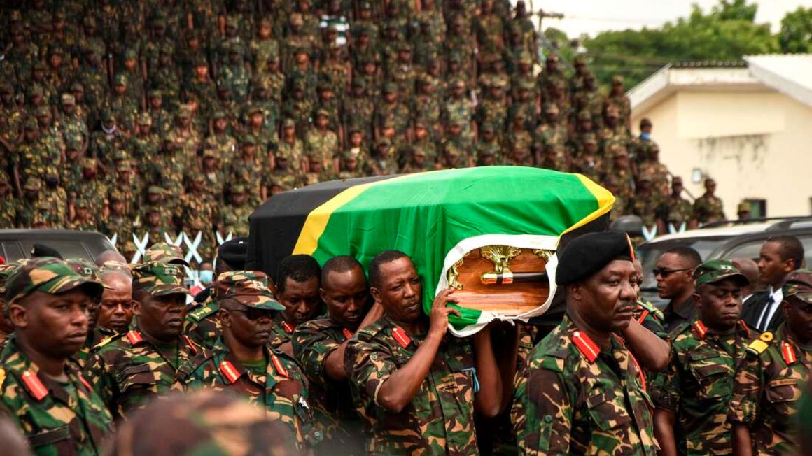 Tanzania People's Defence Force (TPDF) personnel carry the coffin of president John Magufuli in Dar es Salaam, Tanzania, on March 20, 2021. PHOTO | STR | AFP