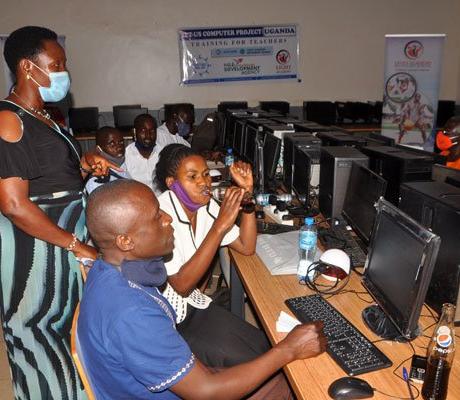 Rosemary Sseninde, the State minister for Primary Education (standing)