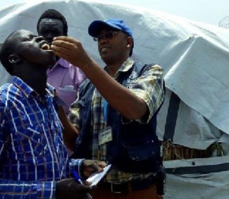 A man receiving a Cholera vaccination