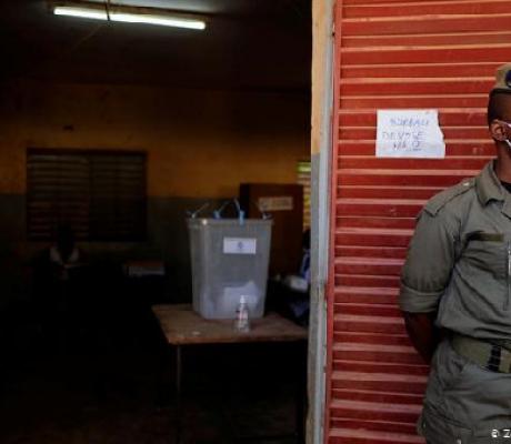 A member of the security force guarding a polling station in Ouagadougou