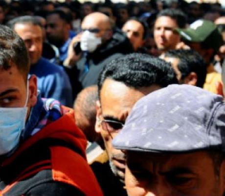 Egyptians who are traveling abroad gather in front of the Egyptian Central Public Health Laboratorie