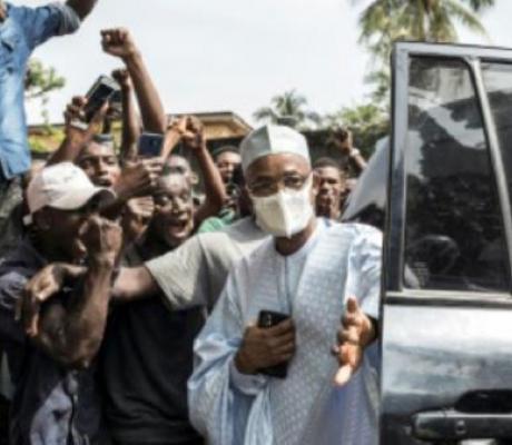 Main opposition candidate, Cellou Dalein Diallo (C) has claimed victory in the election