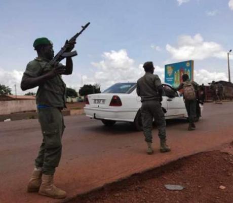 Soldiers patrol after gunshots were heard Tuesday at a military camp near Kati area in Bamako, Mali