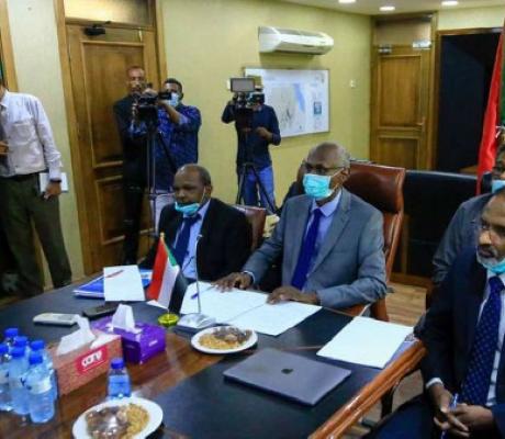 Sudan's Minister of Irrigation and Water Resources Yasir Mohamed (centre) in a video meeting
