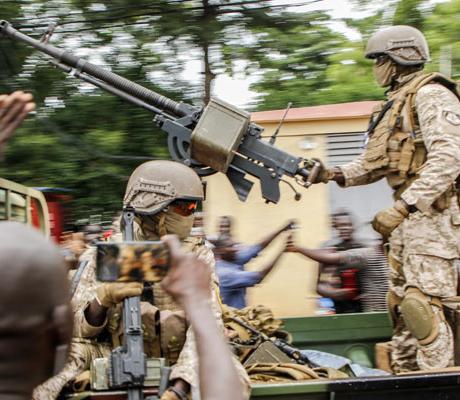 The mutinying soldiers were cheered by crowds as they reached the capital Bamako on Tuesday