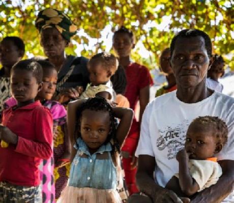 Vicente (right) heads a family of 30 people who fled the armed attacks in Mozambique