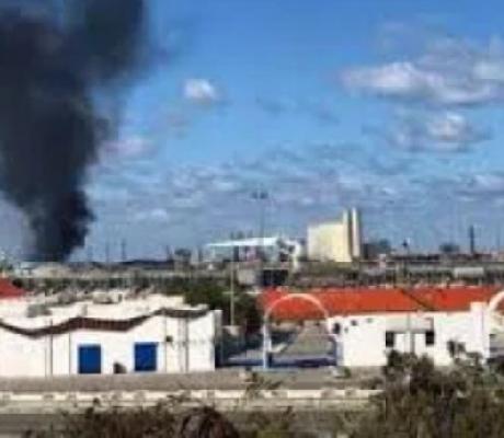 Smoke rises from the port in Tripoli after being attacked in Libya